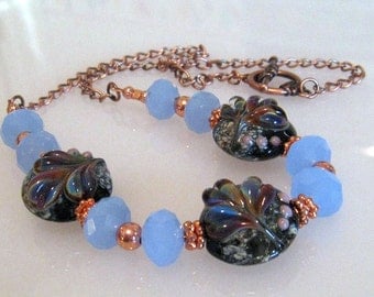Lampwork Bead Necklace: Fleur de Lis, Blue Crystal and Lampwork Bead Necklace, Copper