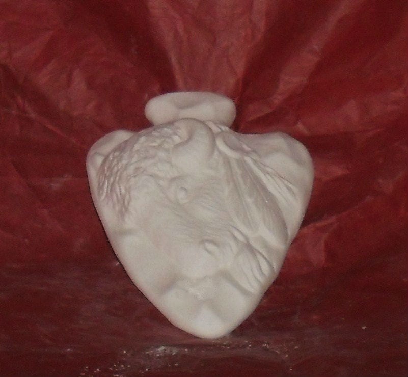 Ceramic Buffalo Arrowhead. Do It Yourself . Ready to paint affordable crafting fun.