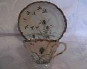 Handpainted Japanese cup and saucer-  889