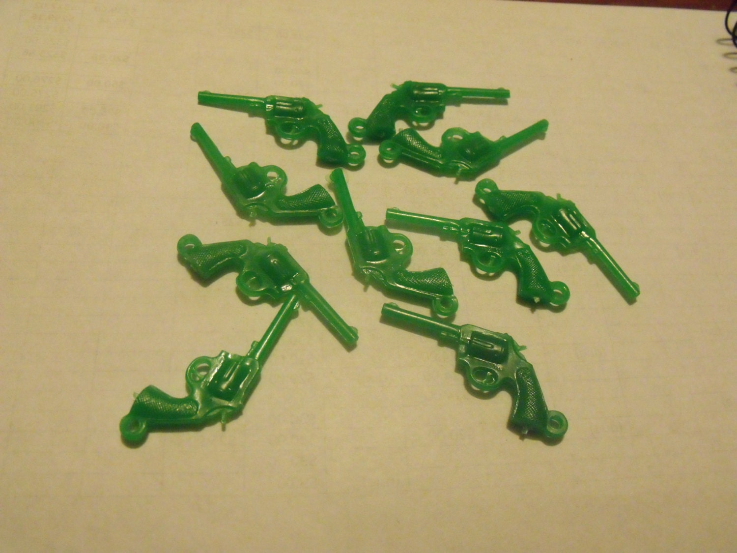 Destash of green plastic gun charms
