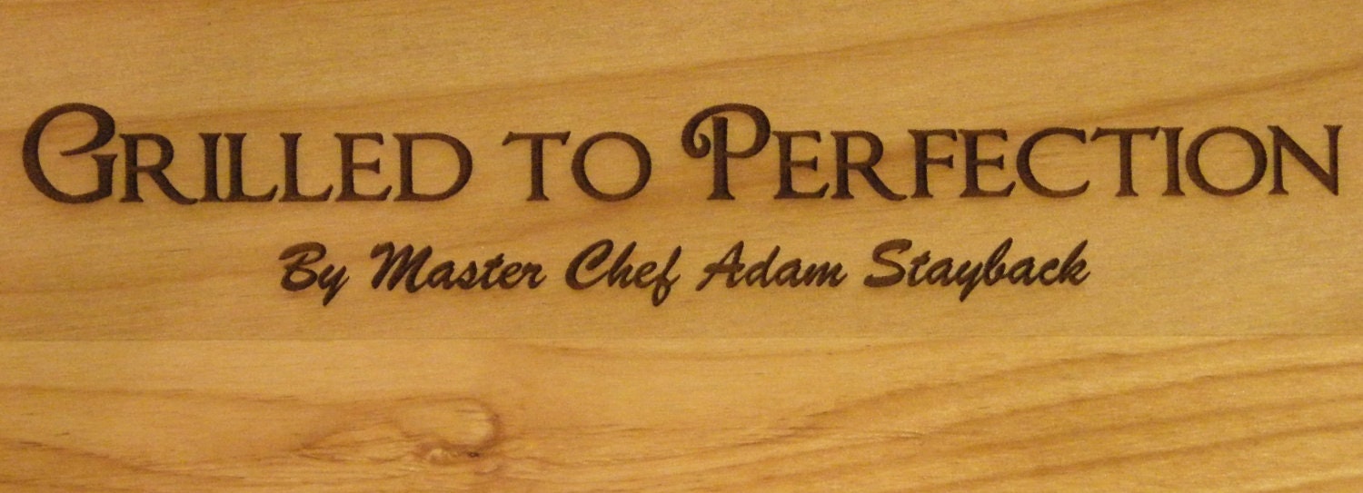 Laser engraved barbeque wood cutting/serving board for the master griller in your life.