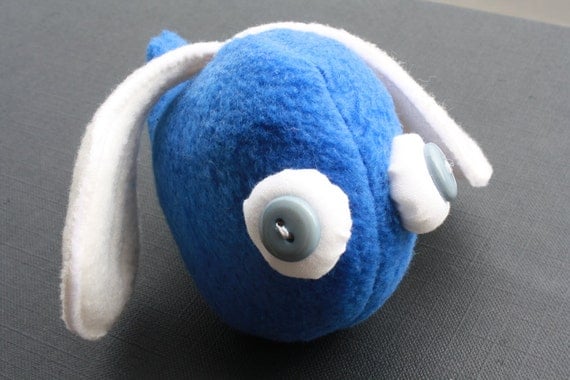 beady-eyed flying blue scrap monster