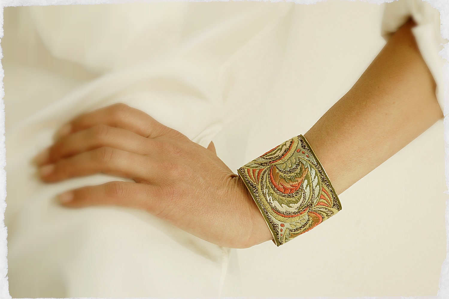 Handmade Vintage French Silk Ribbon Bracelet Cuff in Green, Orange & Gold swirling wave motif, embellished with Swarovski crystals