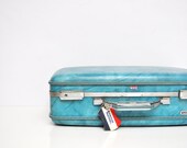 Turquoise American Tourister Suitcase