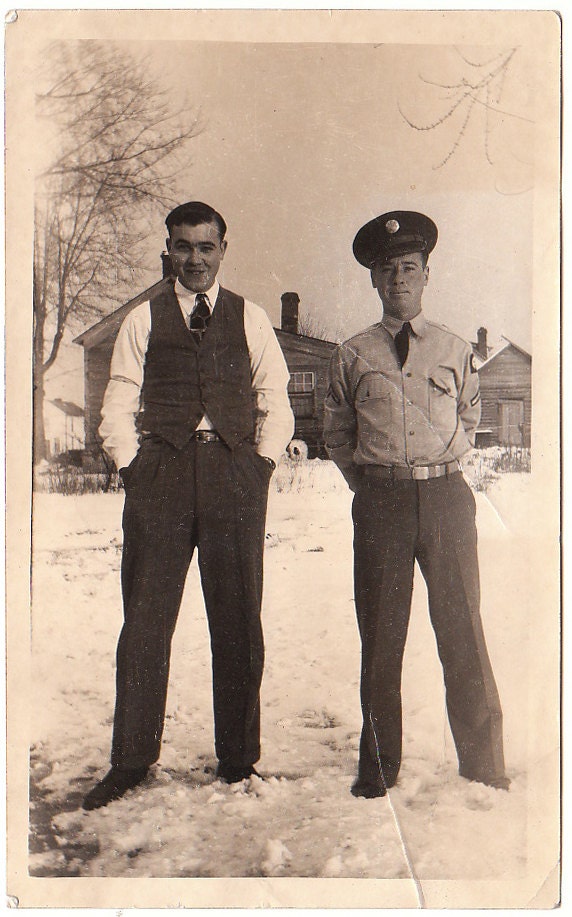 Great Vintage Photograph of a soldier and guy wearing a suit