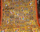 vintage wall hanging made from old india and pakistan tribe dresses with mirror work