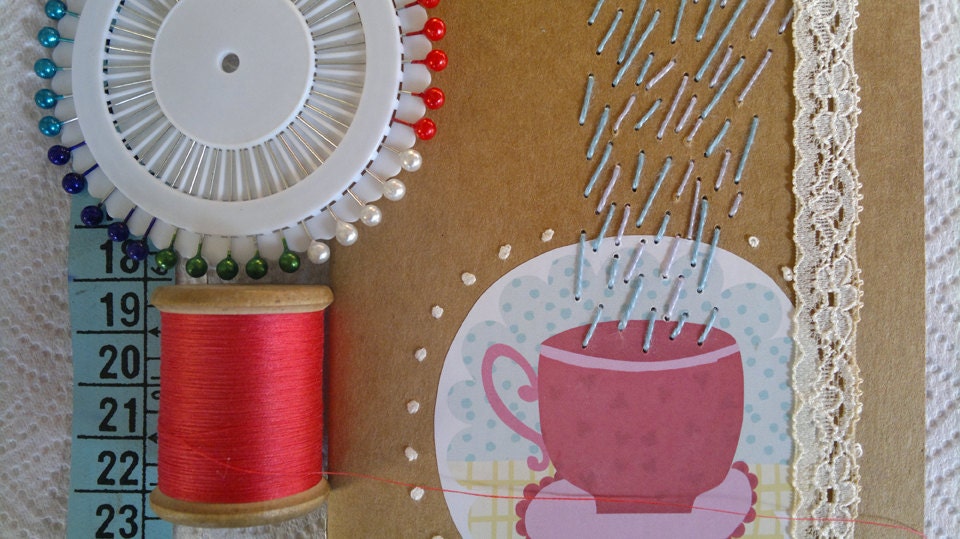Embroidered sketchbook with colorful threads, cup of tea design , cardboard cover and beautiful lace.