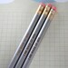 I am made of win. 3 three silver Self congratulatory pencils make writing and test taking fun again. halloween treats that won't rot teeth.