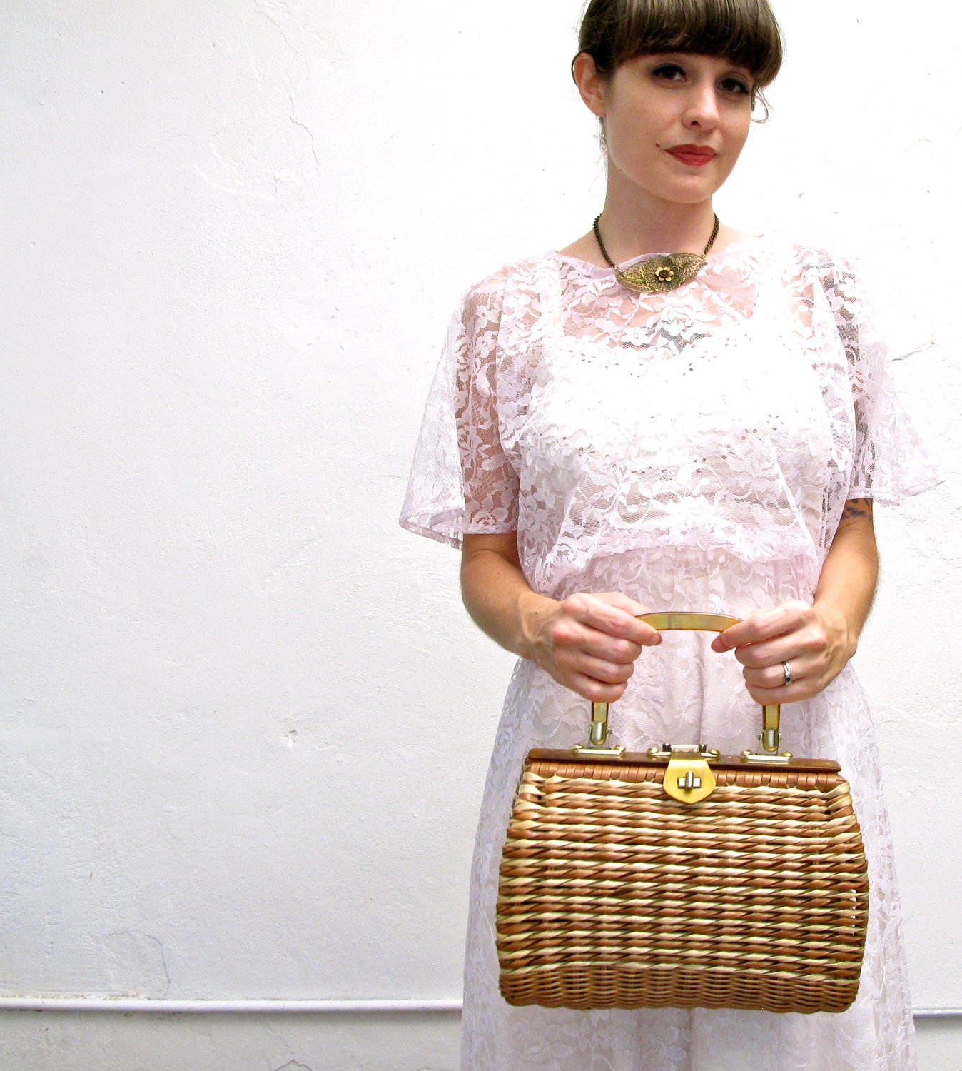 the last straw. vintage 60s cute straw purse with tortoise lucite handle & brass hardware