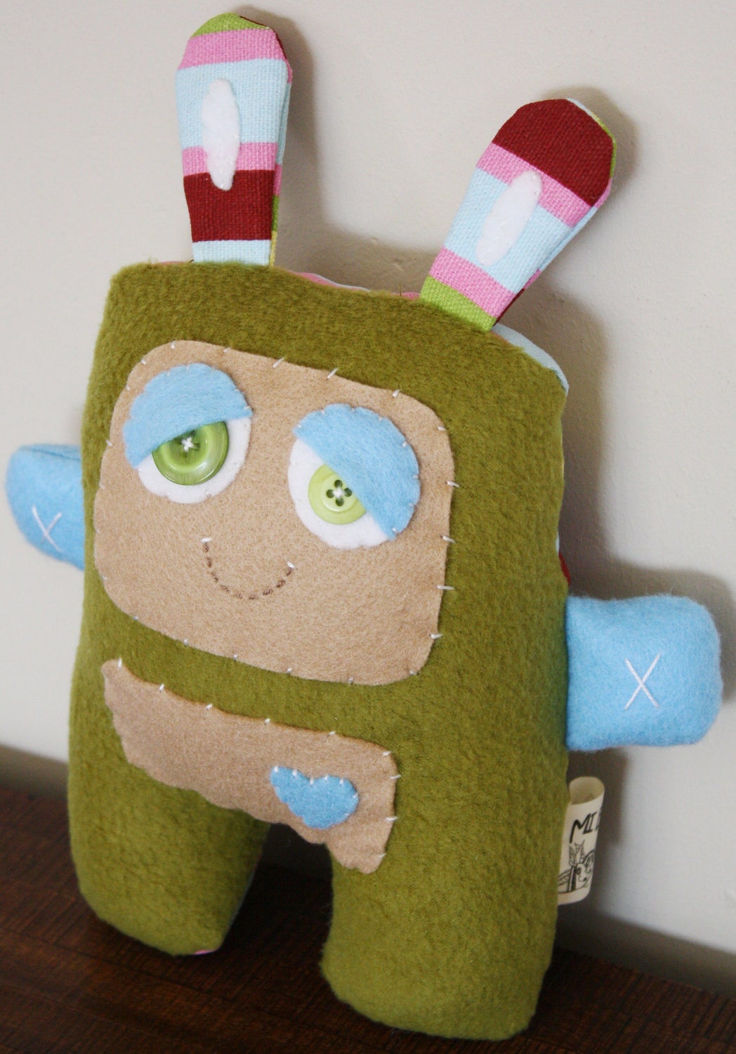 BOObeloobie Bella the Bearling in Olive green, with multicoloured striped fabric on her back