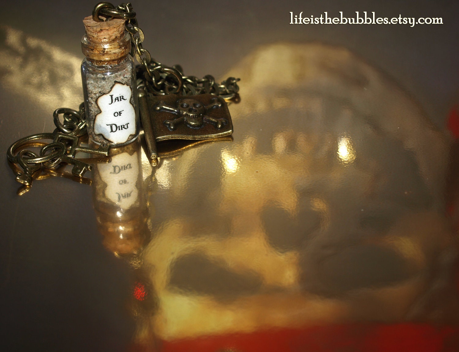 Pirate Treasure Jar of Dirt, Key Ring, and Jolly Roger Flag Charm Necklace  Disney Pirates of the Caribbean Jack Sparrow