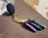 mystic moon.  a rainbow quartz crescent moon necklace.