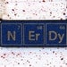 Periodic Table necklace -- science jewelry geekery -- laser etched book cover