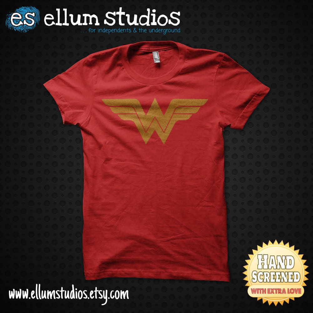 Wonder Woman Screen Printed Unisex Tee. 4 Colors Available, Printed With Eco Friendly Water-Based Ink On Lightweight Tees.