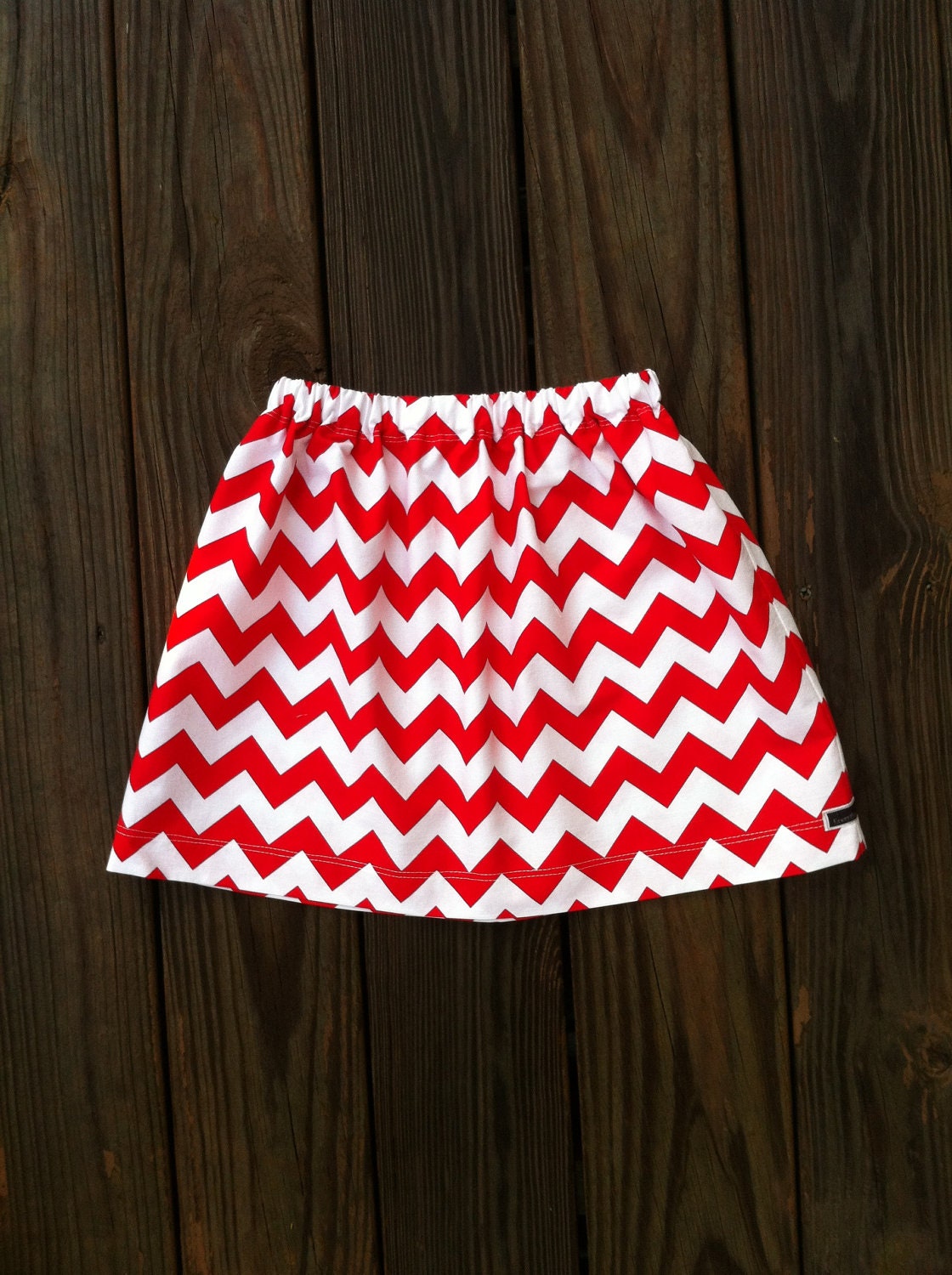 Girls twirly skirt. Mod Riley Blake red white or any color chevron zig zag skirt. Custom Boutique children's clothing. By EverythingSorella.