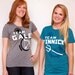 Women's Hunger Games Team Peeta T-Shirt with Bread Graphic, Blue, SIZE MEDIUM