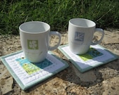 Coasters Mug rugs, set of 2 with patchwork in green, turquoise, white