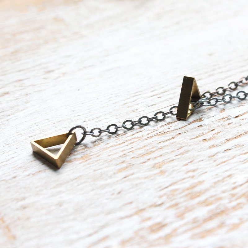 Minimalist Gold Triangle Lariat Necklace / long oxidized black sterling silver chain / brass triangle charms / everyday geometric jewelry