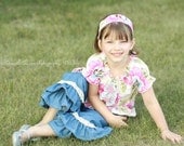Denim double ruffle pants with vintage style lace accent. Available sizes 12 months to 6 years.  Larger sizes available.