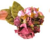 Floral hair clip with purple rose buds and deep mauve rose on velvet leaves...