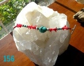 Turquoise color Howlite with Red Coral and ornate Pewter Beads and Heart Toggle Bracelet.