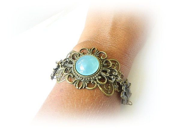 Antique brass bracelet blue moon