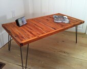 Modern industrial coffee table featuring reclaimed barnwood top and hairpin legs. Urban contemporary, mid century modern style.