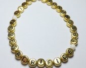 Truth, Self Sacrifice, Friendship Saying Mother of Pearl Beadwork Stretch Bracelet