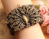 peacock bracelet,retro bronze big Magnificent peacock,brown braid leather bracelet---B153