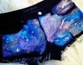 High waist galaxy shorts- black background with purple, blue, and silver star dust hand painted on the front