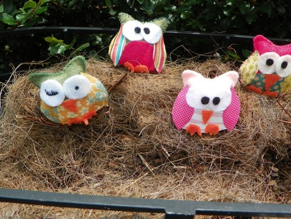 2 1/2 " x 3" stuffed owls made from felt, card stock and stitched by hand.