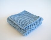 hand knit light pastel blue cotton washcloth and bath scrubber set