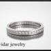 Beautiful 14K diamond design eternity band.