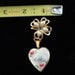 California Hand Painted Mother Of Pearl Gold Tone Lock Dangling Brooch