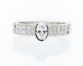 Platinum Diamond Engagement ring. Two row. Oval Diamond Platinum Ring. Classic style. Luxury diamond ring. Pave setting, bezel setting.