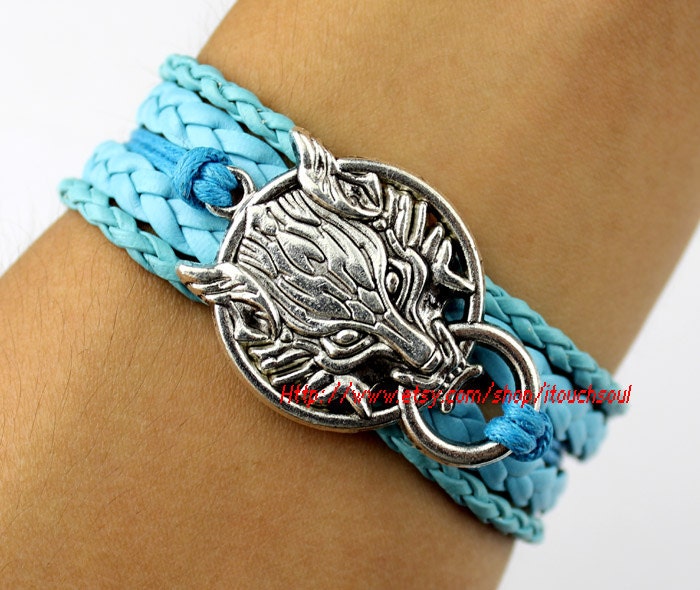 Wolf bracelet charm bracelet, ancient silver bracelet, blue leather, the charm of friendship featured image