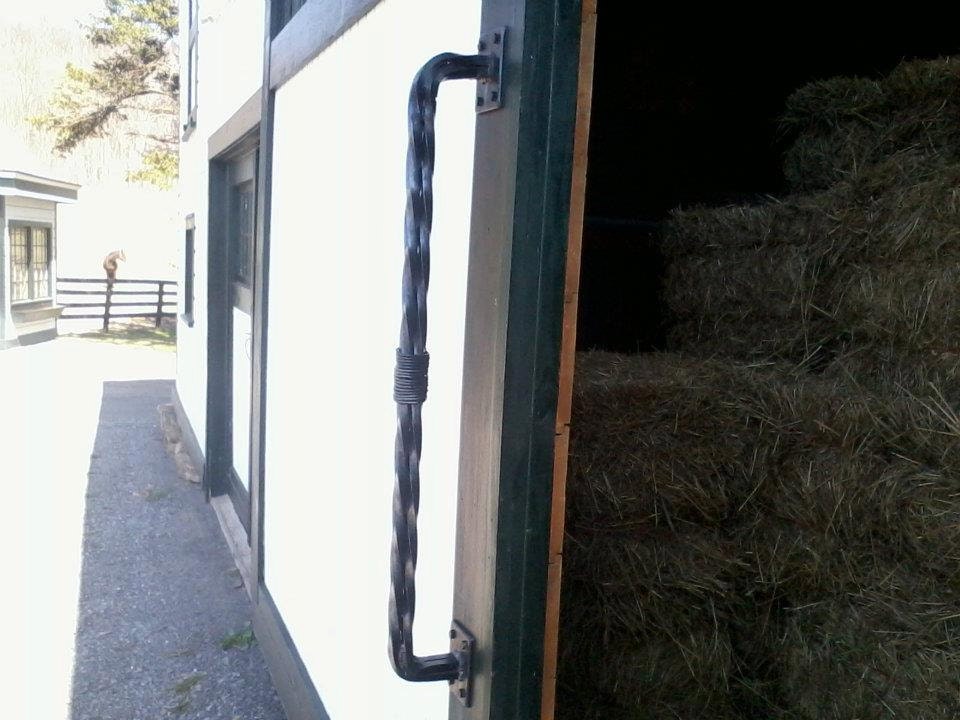 Custom door handles, made to order, shown here as a vintage looking addition to a barn door