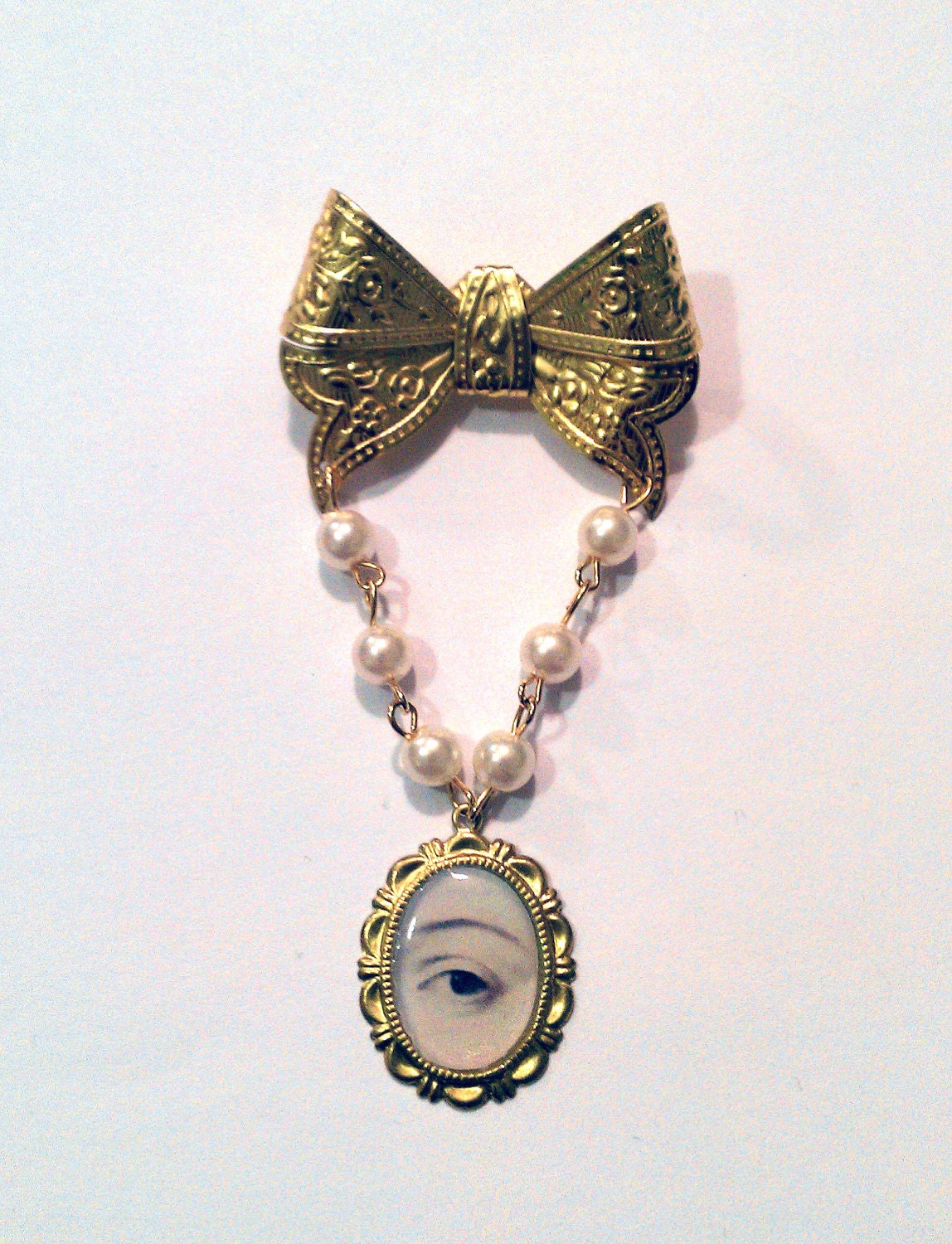 Gold Brooch - The Jewel