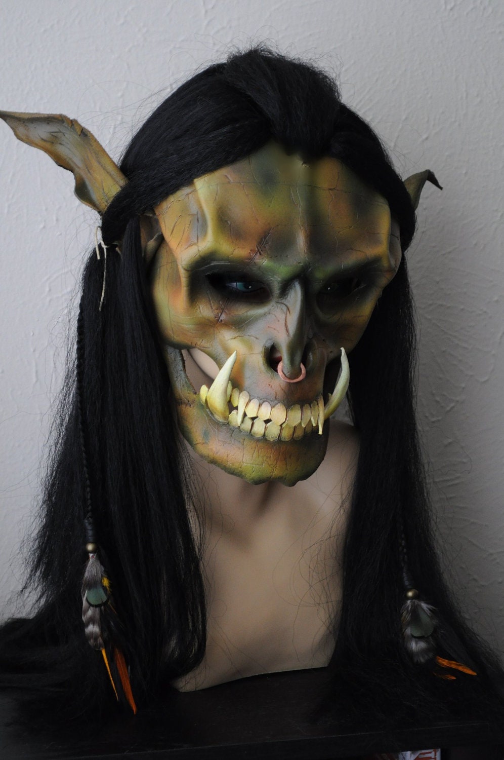 Leather Orc Mask. full face with synthetic Hair. Handmade by Parkers and Quinn.green/brown mottled. Beads wood leather feathers,metal.