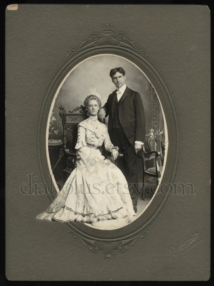 Unusual Vintage Photo / Woman's Dress Hangs Outside of Frame