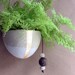 Ceramic miniature hanging planter with earthy natural tones - brown wood stoneware gold