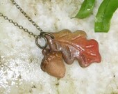 Pottery Acorn and Autumn Leaf Dual Charm Pendant / Hand Sculpted Ceramic and Antique Brass
