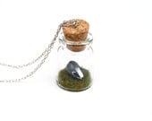 Miniature Badger Jar Necklace - miniature spring badger sat on a bed of grass inside a glass jar, on a 16 inch chain.