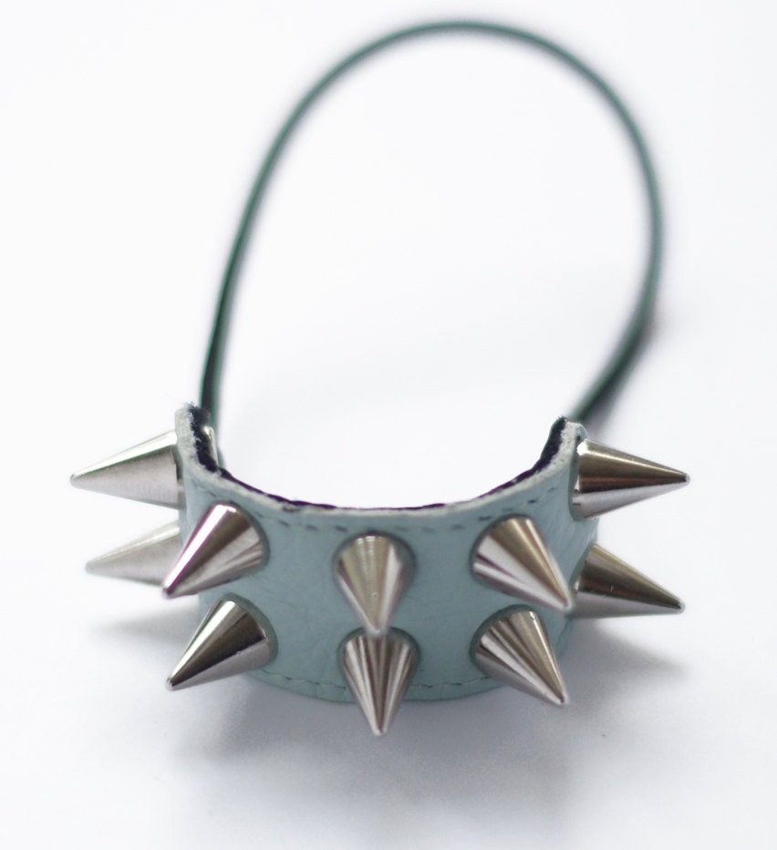 Handmade mint leather spiked hair elastic with golden or silver mini cone spikes.