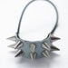 Handmade mint leather spiked hair elastic with golden or silver mini cone spikes.