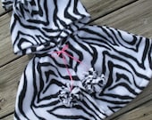 Zebra Print Hooded Capelet with Pom-Poms