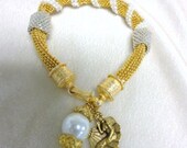 mermaid charm bracelet .bead woven bracelet. spiral beaded bracelet. beadwork bracelet .fine jewelry. seed bead jewelry