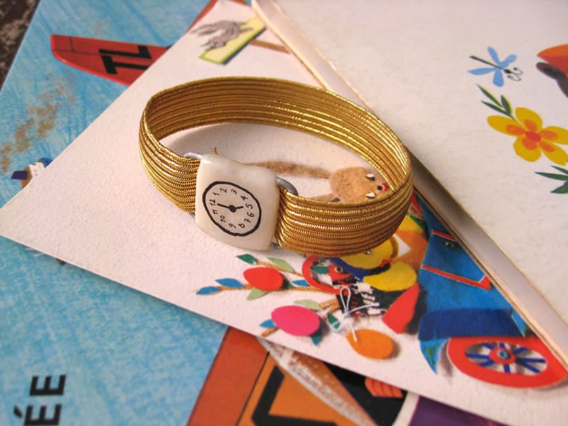 Golden Fake watch with elastic watchband bracelet. One-of-a-kind handmade Porcelain toy clock.