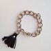 Tassel bracelet in black leather