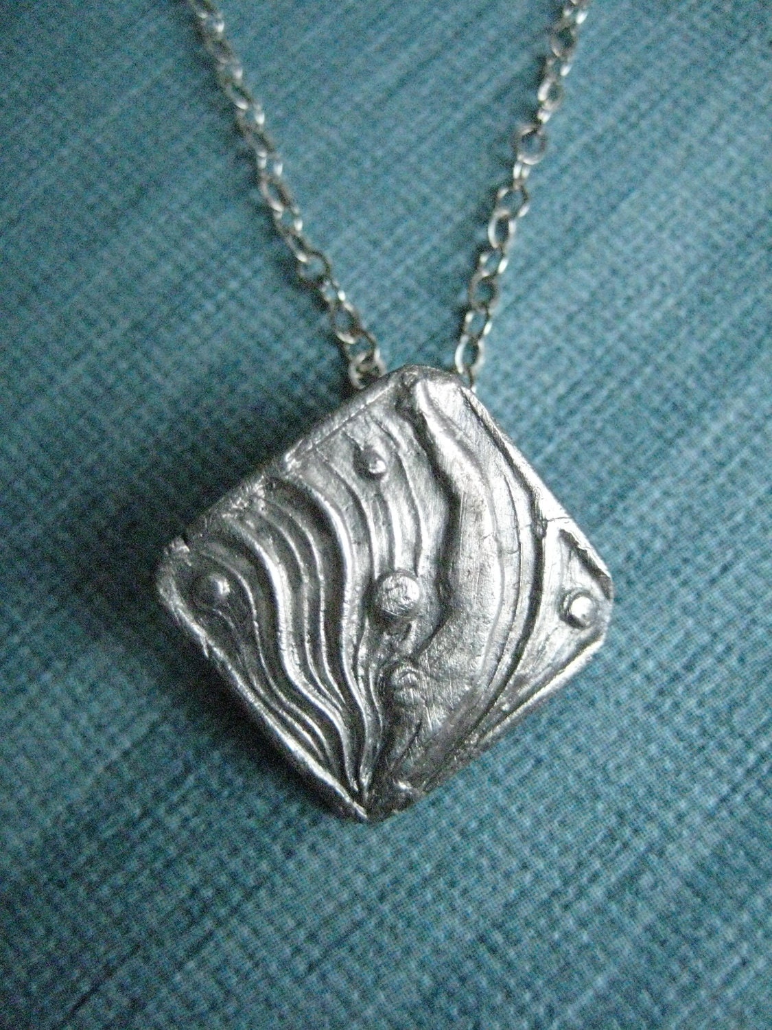 Swimming in the deep blue charm necklace